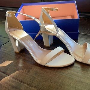 Stuart wit man white shoes